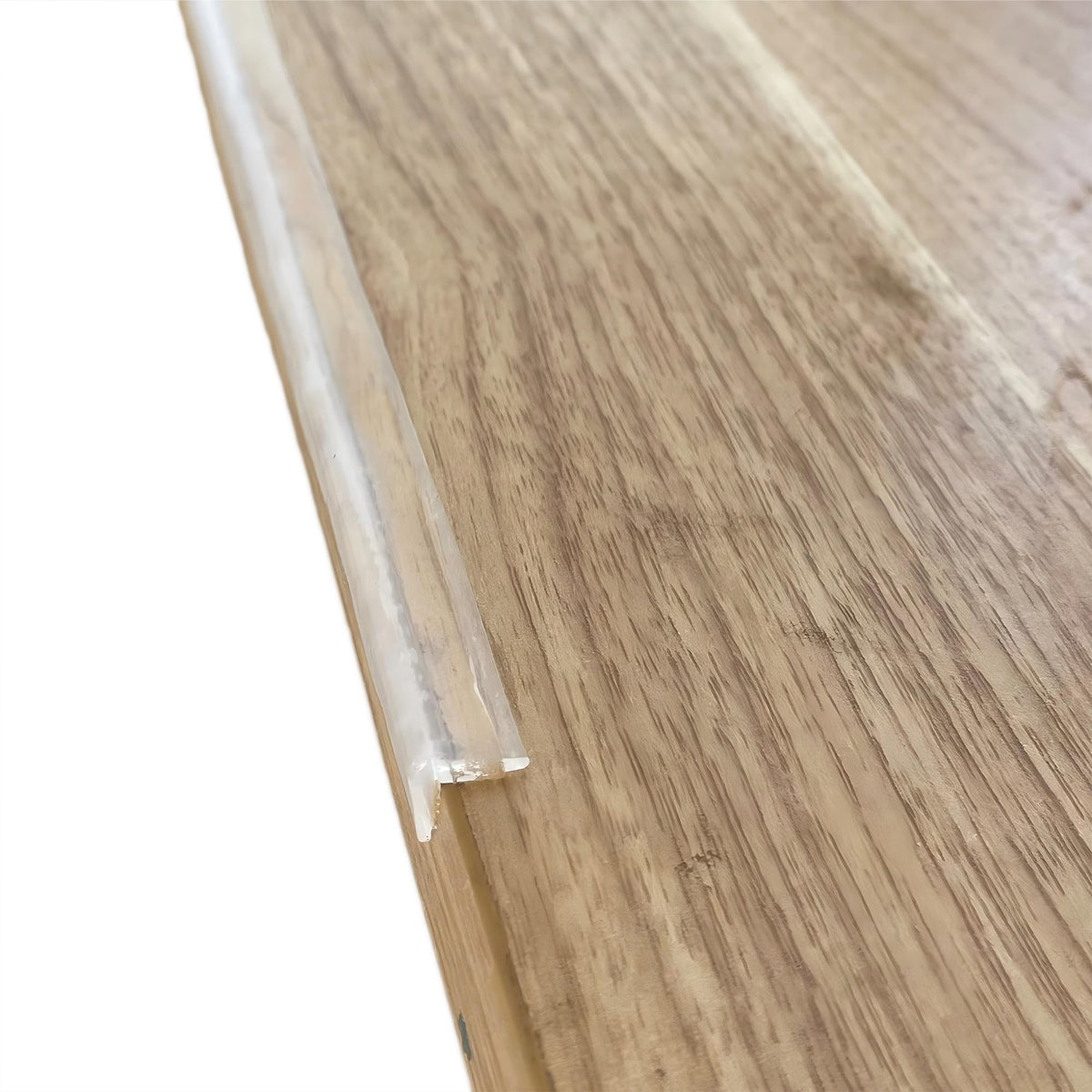 Angloria front packaging showing clear silicone edge protector and 12 ft coverage benefit