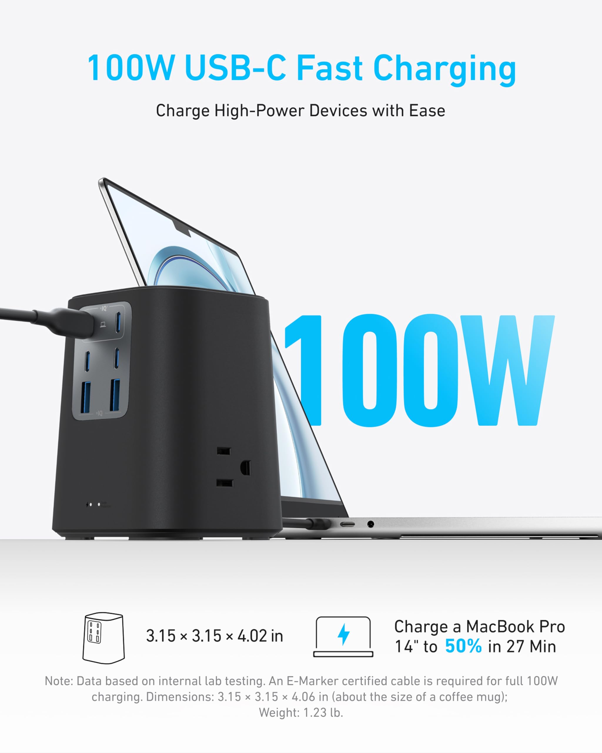 Anker charger in use on a desk powering laptop, phone, and lamp for multi-device convenience