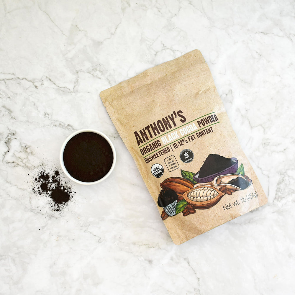 One-pound bag of Anthony's black cocoa beside ruler showing scale and shelf-ready size