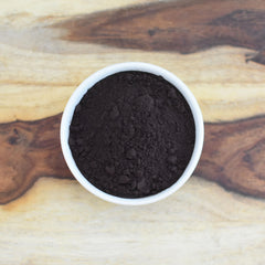 Chocolate cake frosted with Anthony's black cocoa showing deep color and visual impact