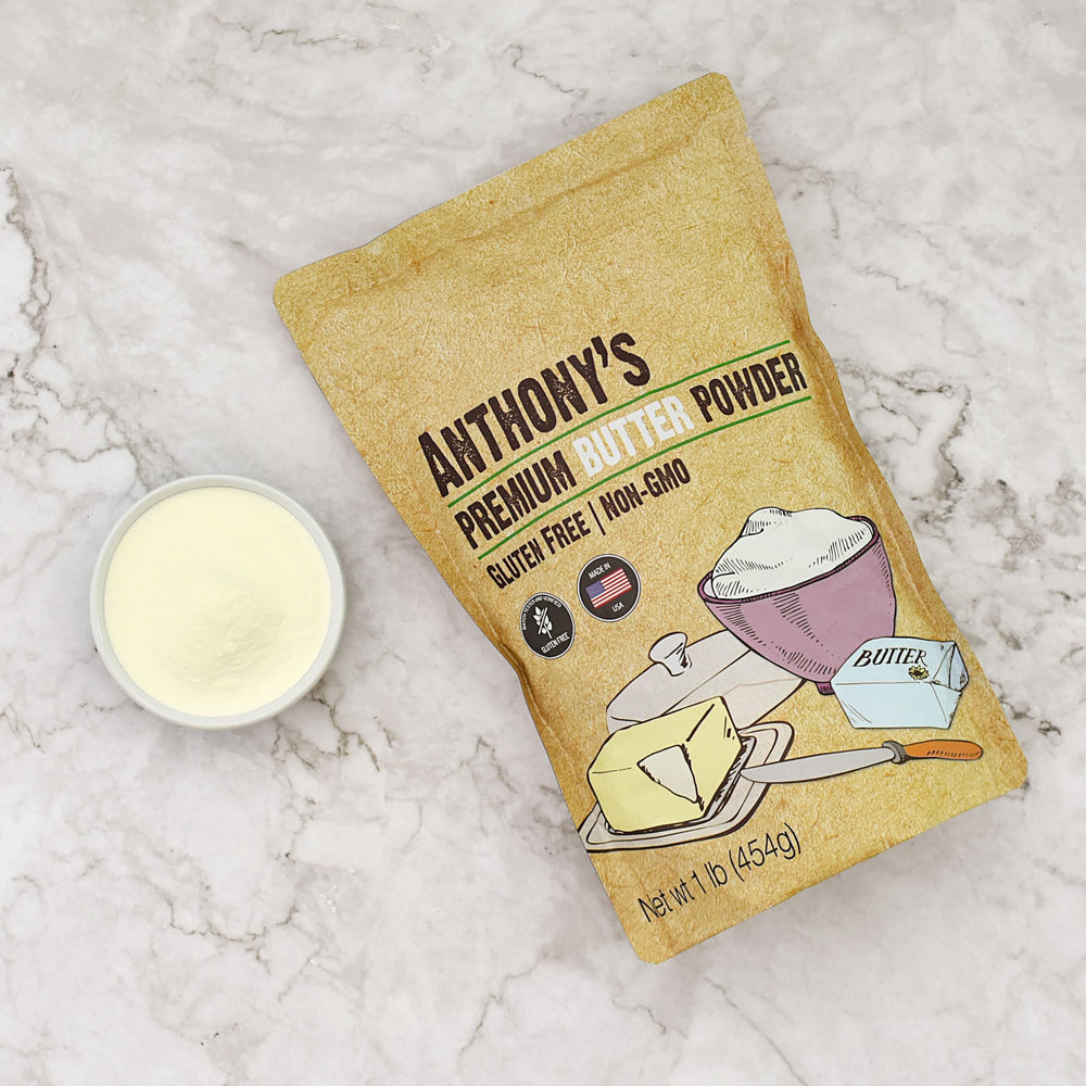 Anthony's butter powder beside measuring cup to show 1 lb scale and portable convenience
