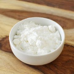 Anthony's measuring spoon with powder illustrating easy portioning and use