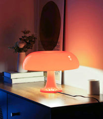 Anykonio orange mushroom lamp front view showcasing warm glow and compact design