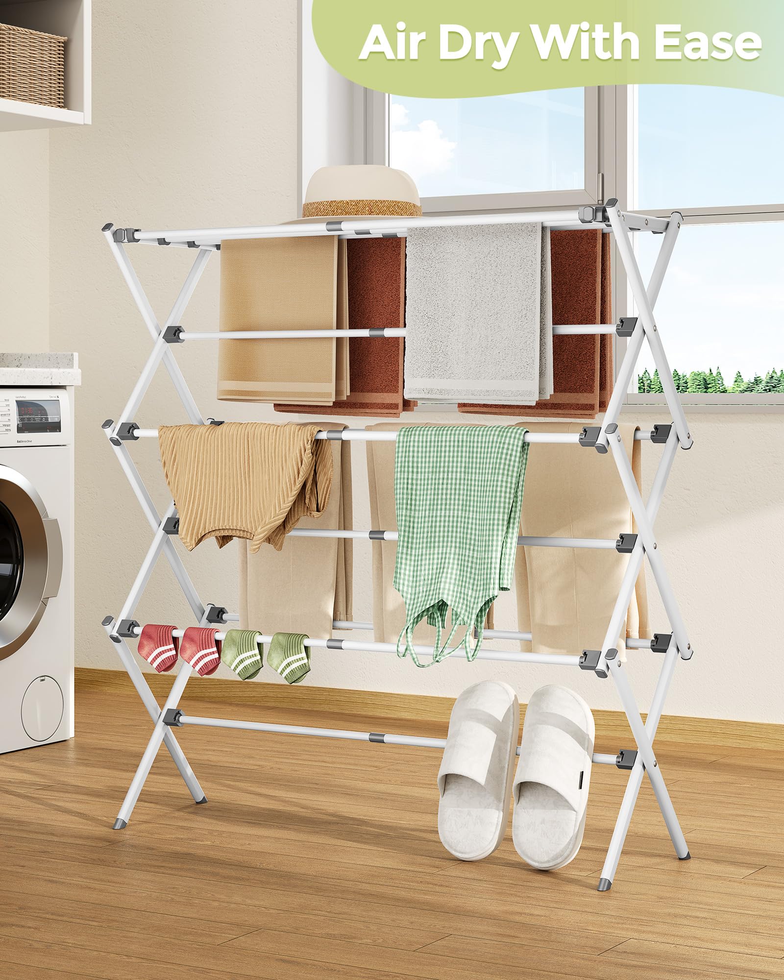 APEXCHASER holding baby clothes to highlight gentle drying for delicates benefit