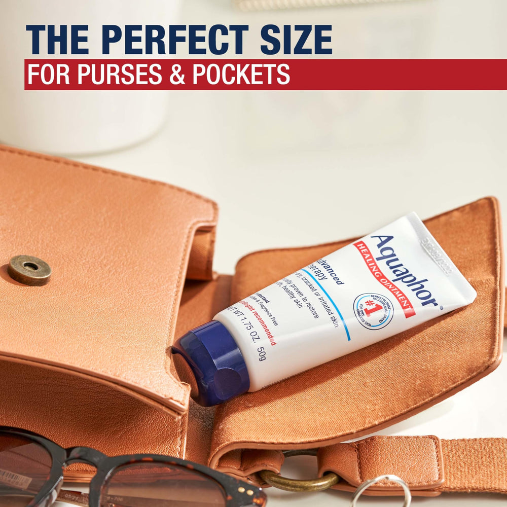 Aquaphor tube beside credit card illustrating compact travel size