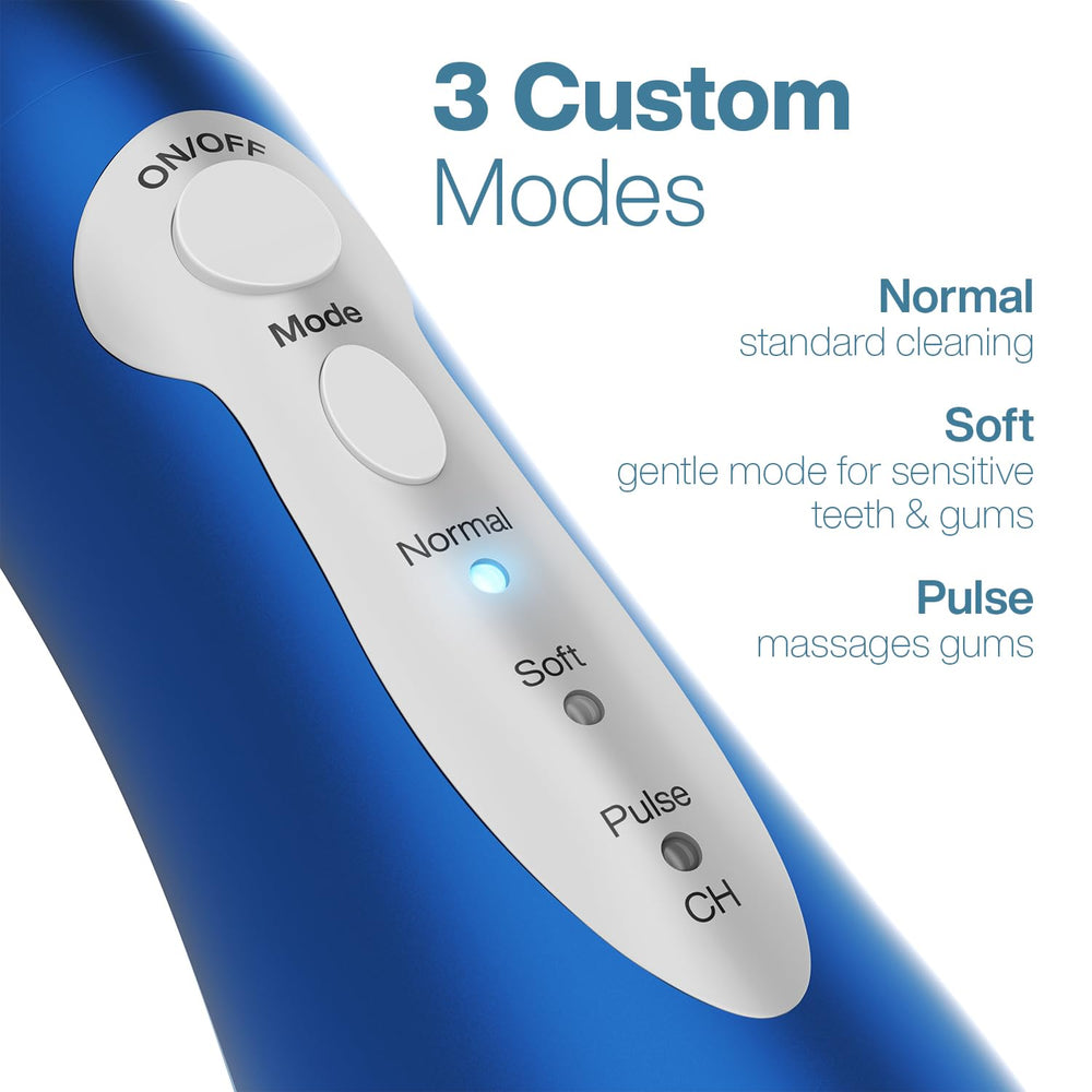 AquaSonic held in hand to show compact size and travel-friendly portability