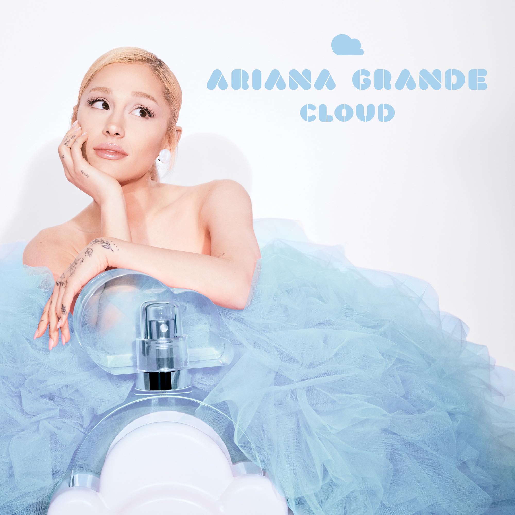Ariana Grande Cloud on vanity with soft textiles conveying a cozy, uplifting mood