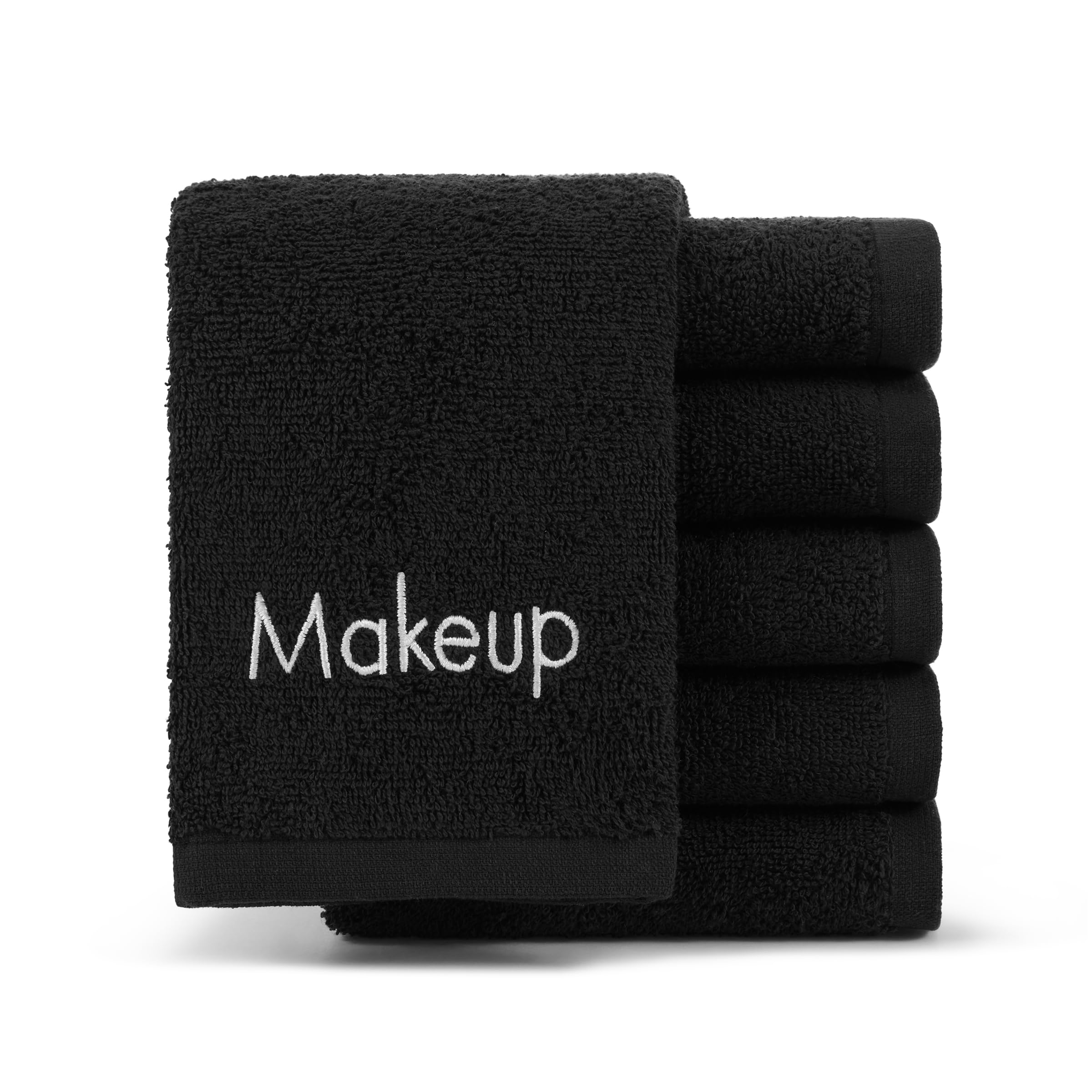 Arkwright LLC front view of six folded black cotton makeup remover cloths showing neat stack and packaging benefit