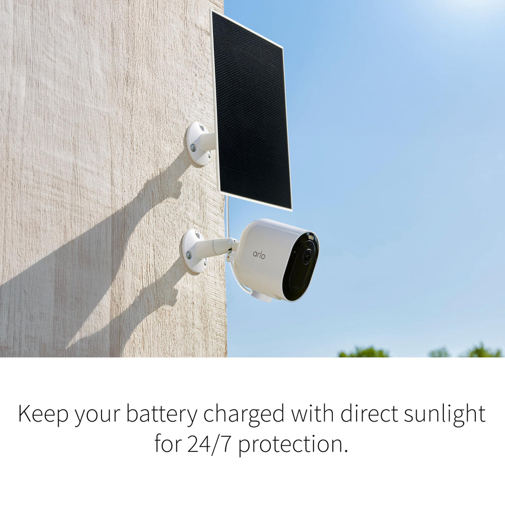 Arlo solar panel mounted beside an Arlo camera demonstrating seamless, wired power benefit
