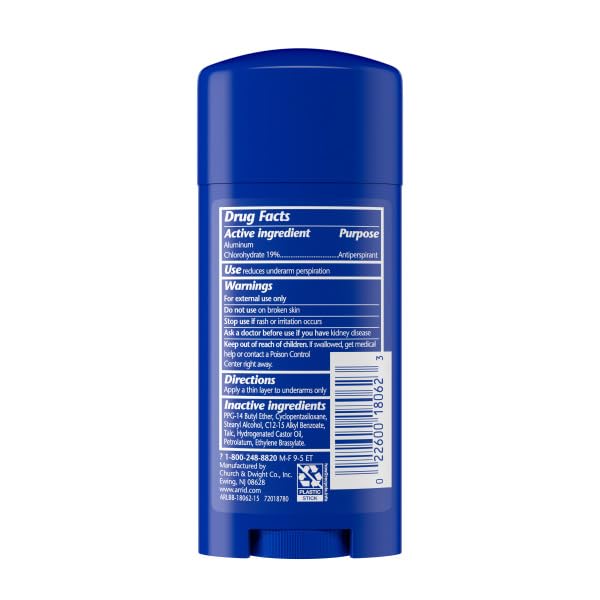 Hand holding Arrid 2.6 oz stick demonstrating compact travel-friendly size