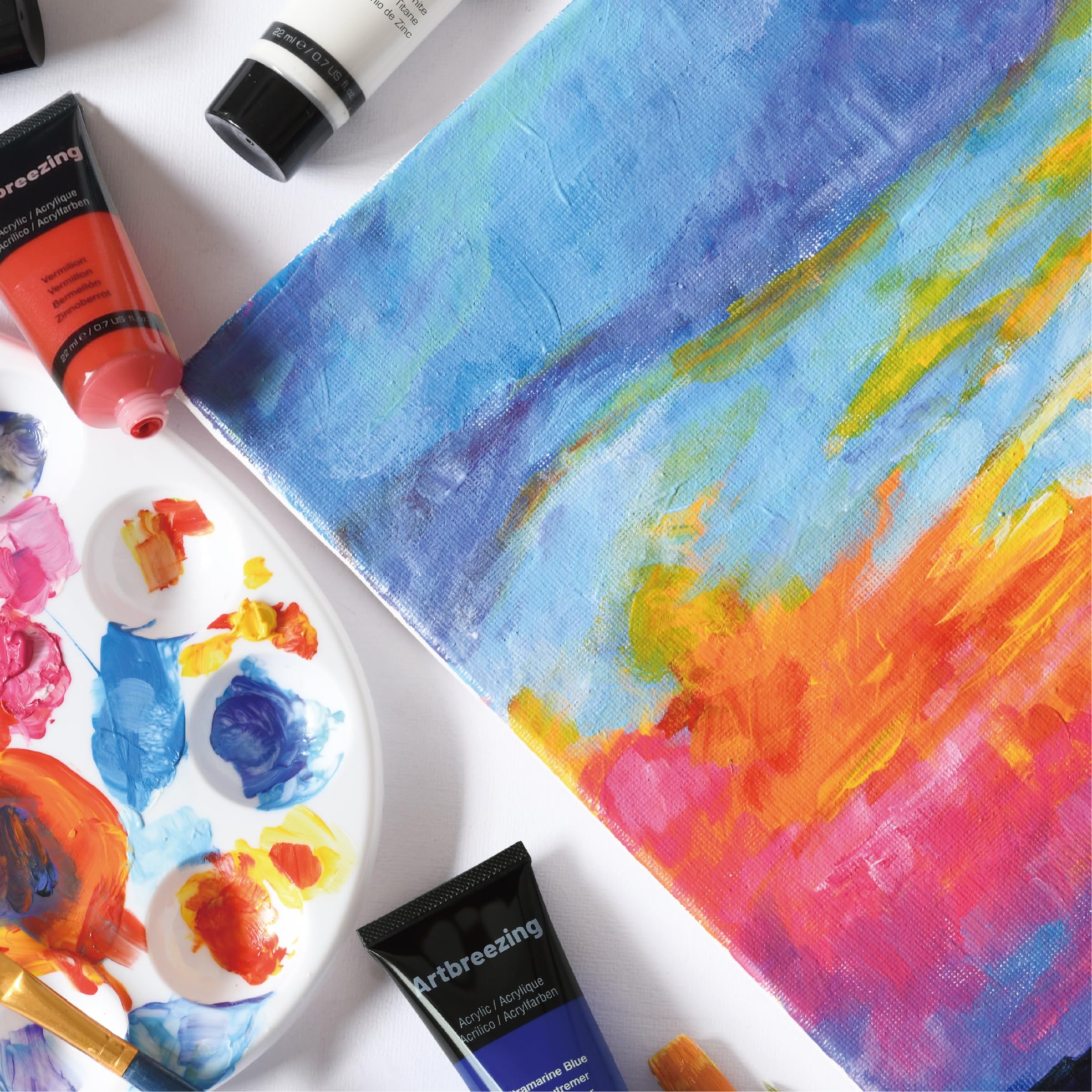 Artbreezing studio scene with paints and tools inspiring creative use