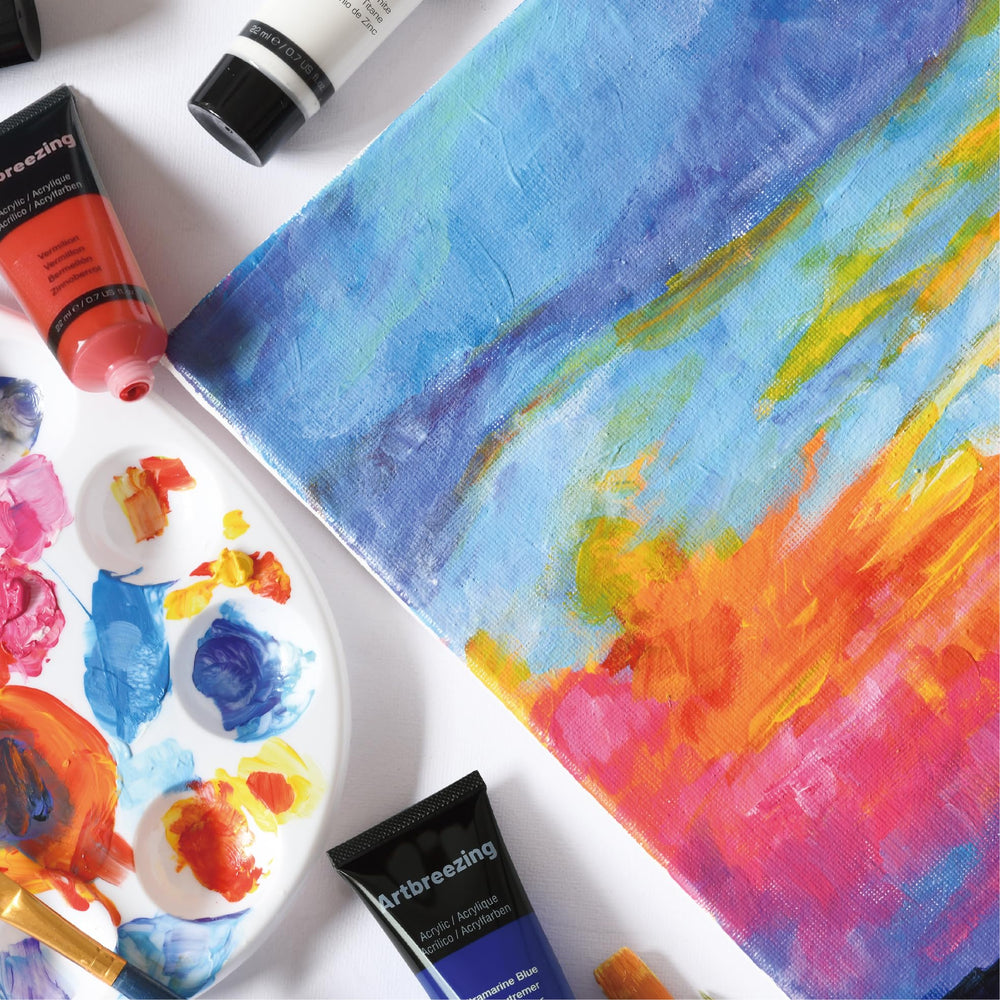 Artbreezing studio scene with paints and tools inspiring creative use