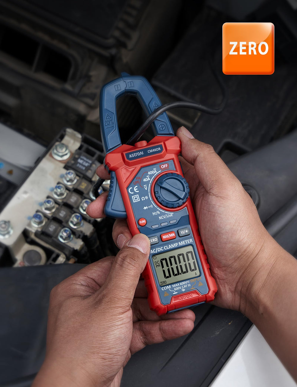 AstroAI clamp meter held in hand to show compact scale and portability advantage