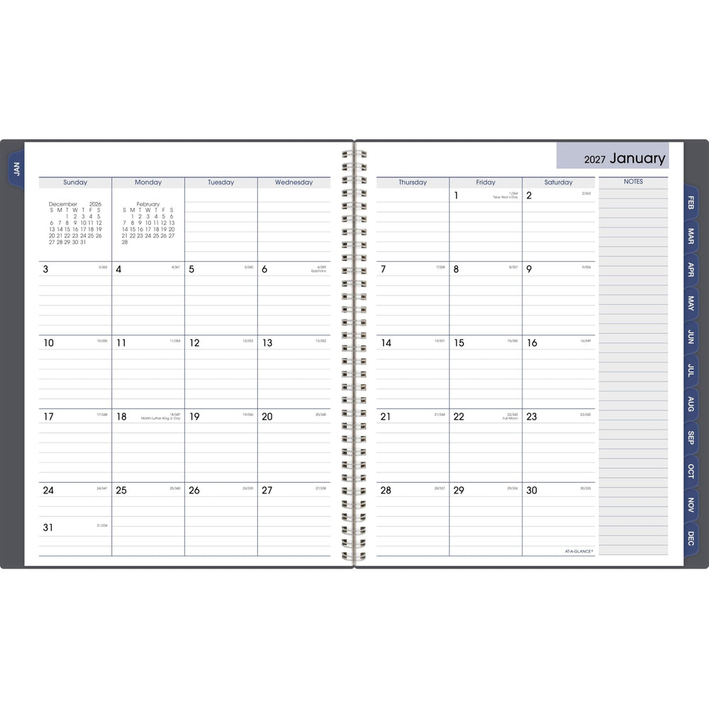 AT-A-GLANCE planner held in hand to show 8.5x11 size