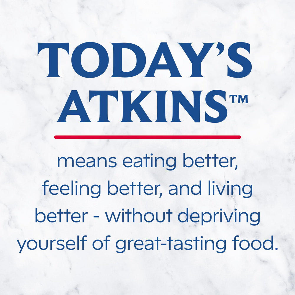 Atkins strong on-the-go lifestyle scene with bottle in gym bag for active convenience benefit