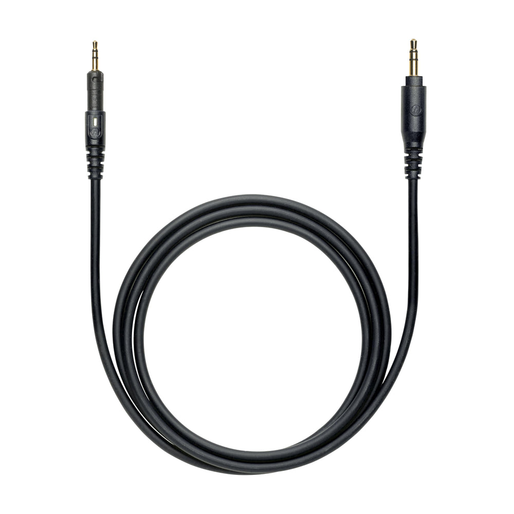 Audio-Technica ATH-M50X beside mixer illustrating studio connectivity and workflow