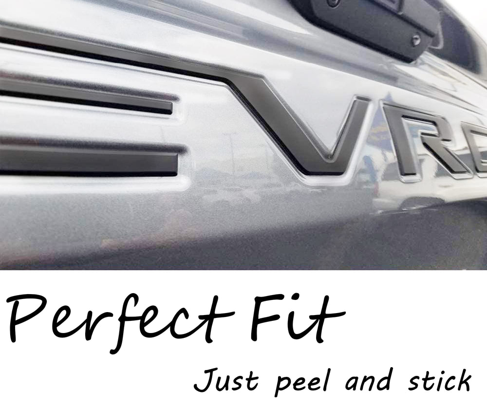 Auto Safety lifestyle shot of Silverado with new letters enhancing curb appeal on the road