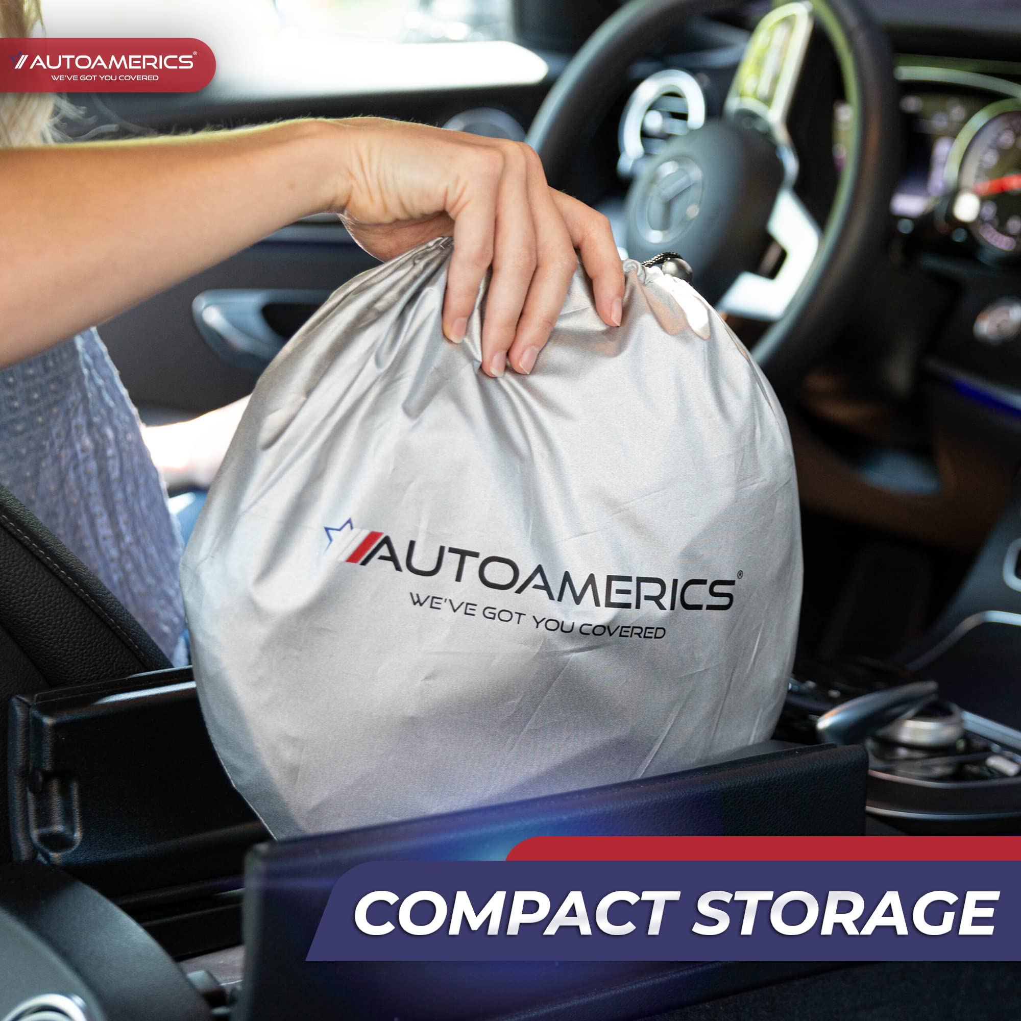 AUTOAMERICS American flag shade in a parked truck creating a shaded, protected interior