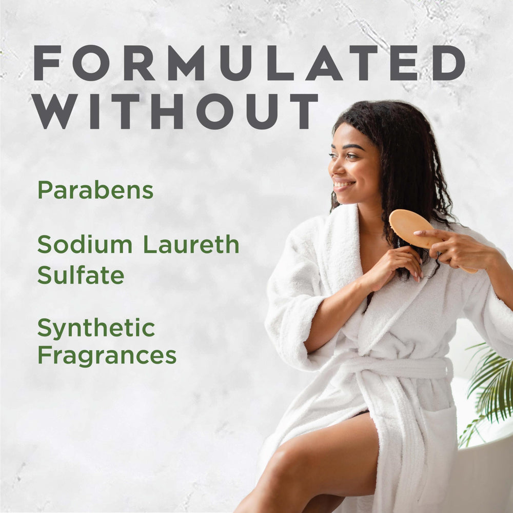 Avalon Organics shampoo being dispensed into palm creating rich lather for effective cleansing