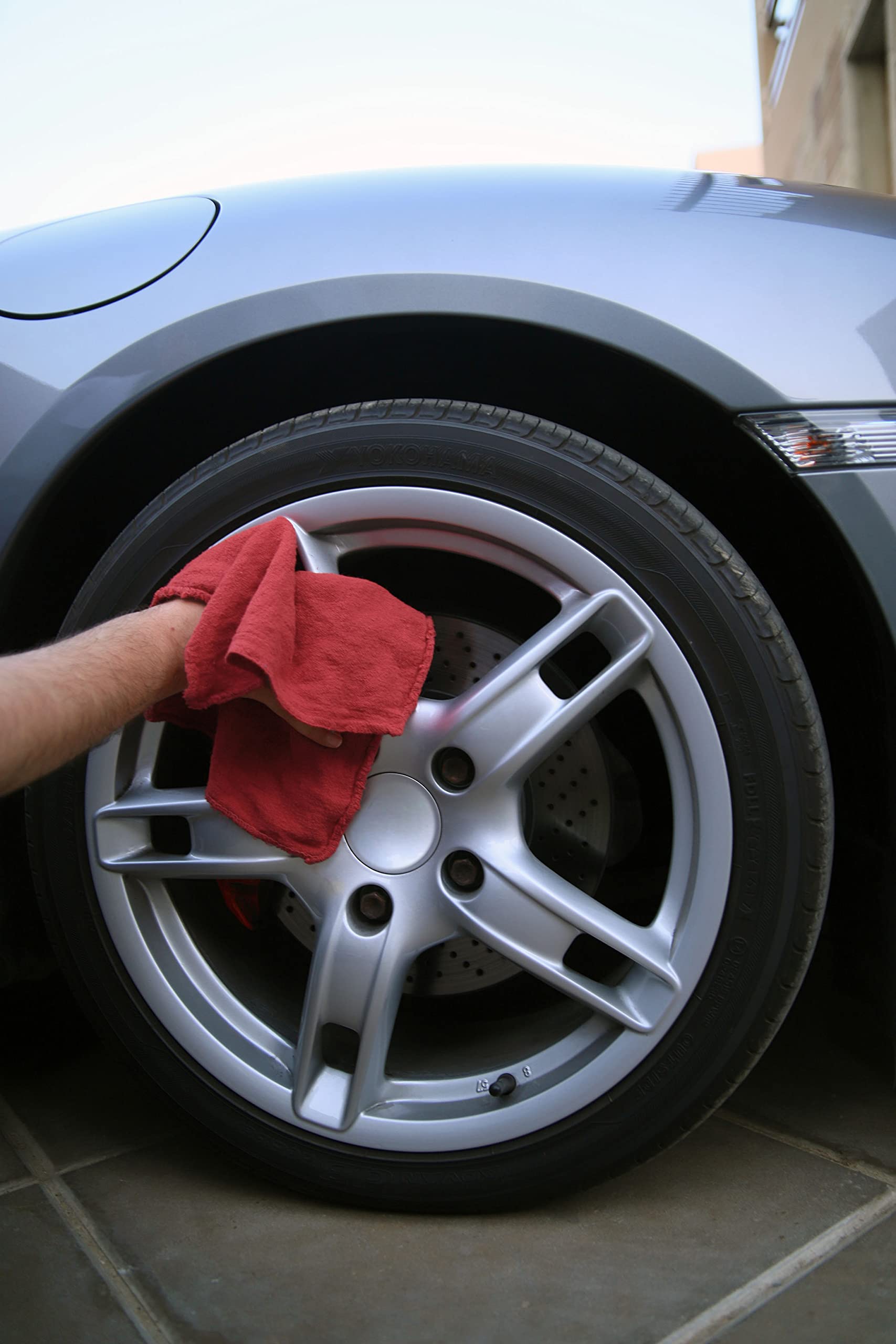 Avalon Towels used wiping car engine demonstrating grease removal