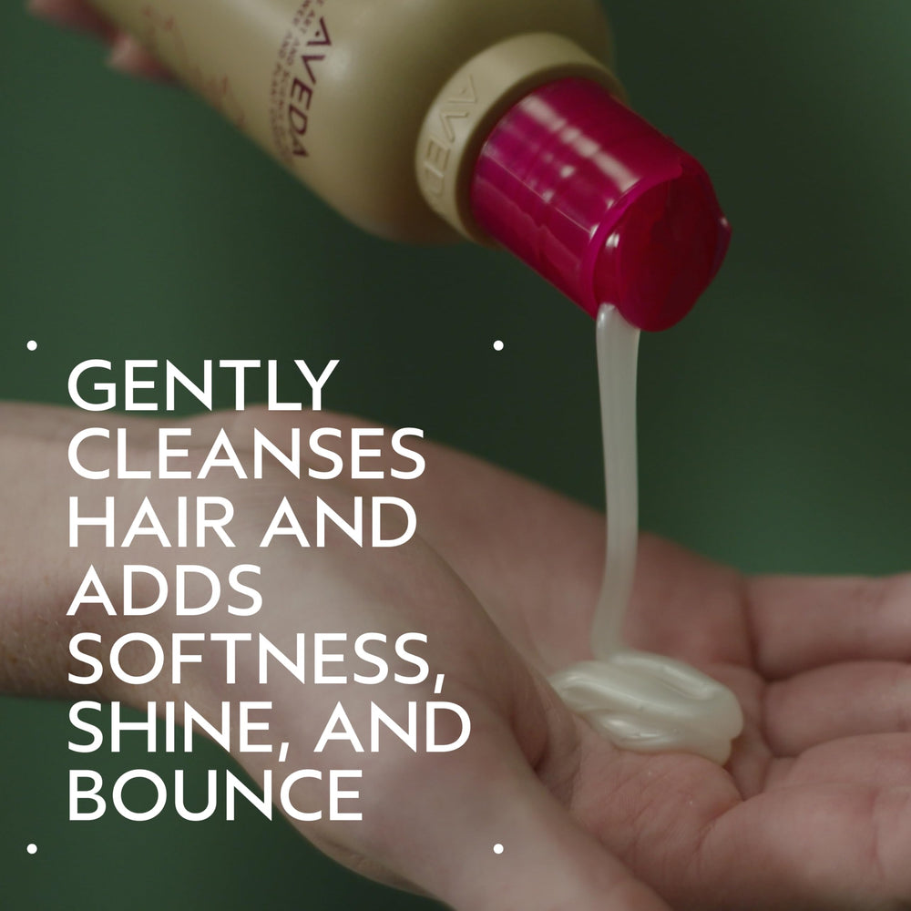 Aveda shampoo texture poured into hand, highlights gentle cleansing action