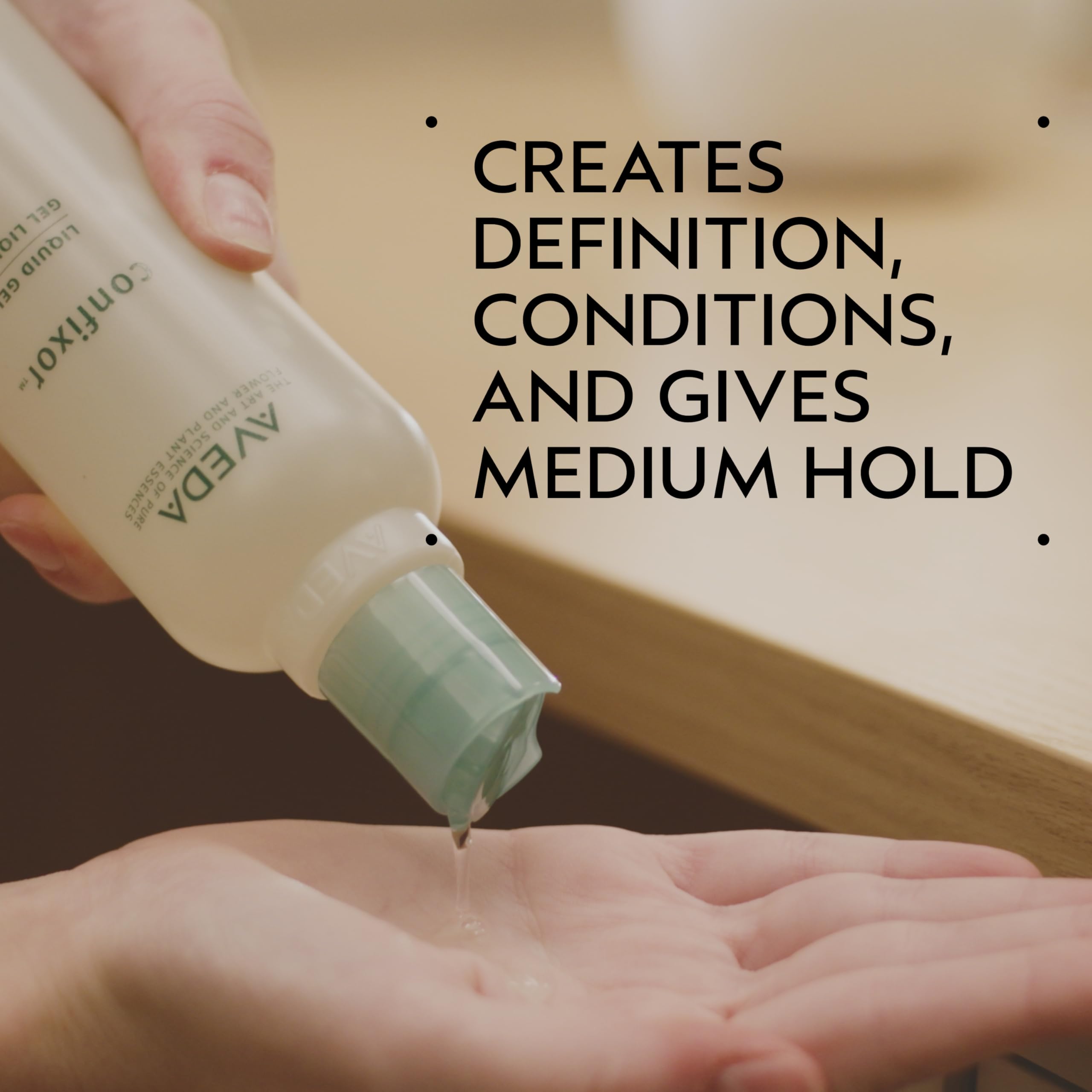 Aveda Confixor pump and cap detail highlighting easy dispensing benefit