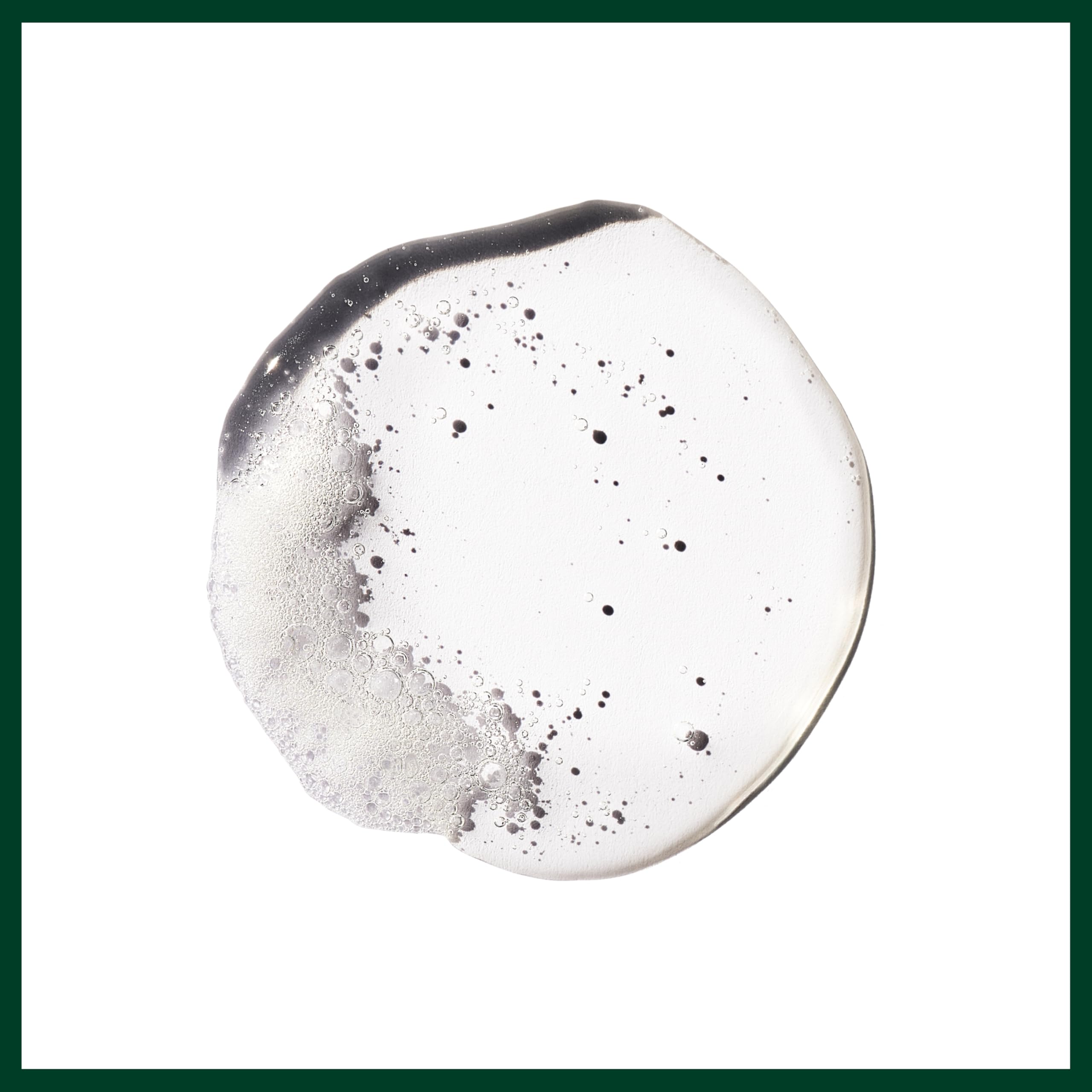 Aveda Flax Seed Aloe used to create a slicked-back hairstyle demonstrating sleek finish