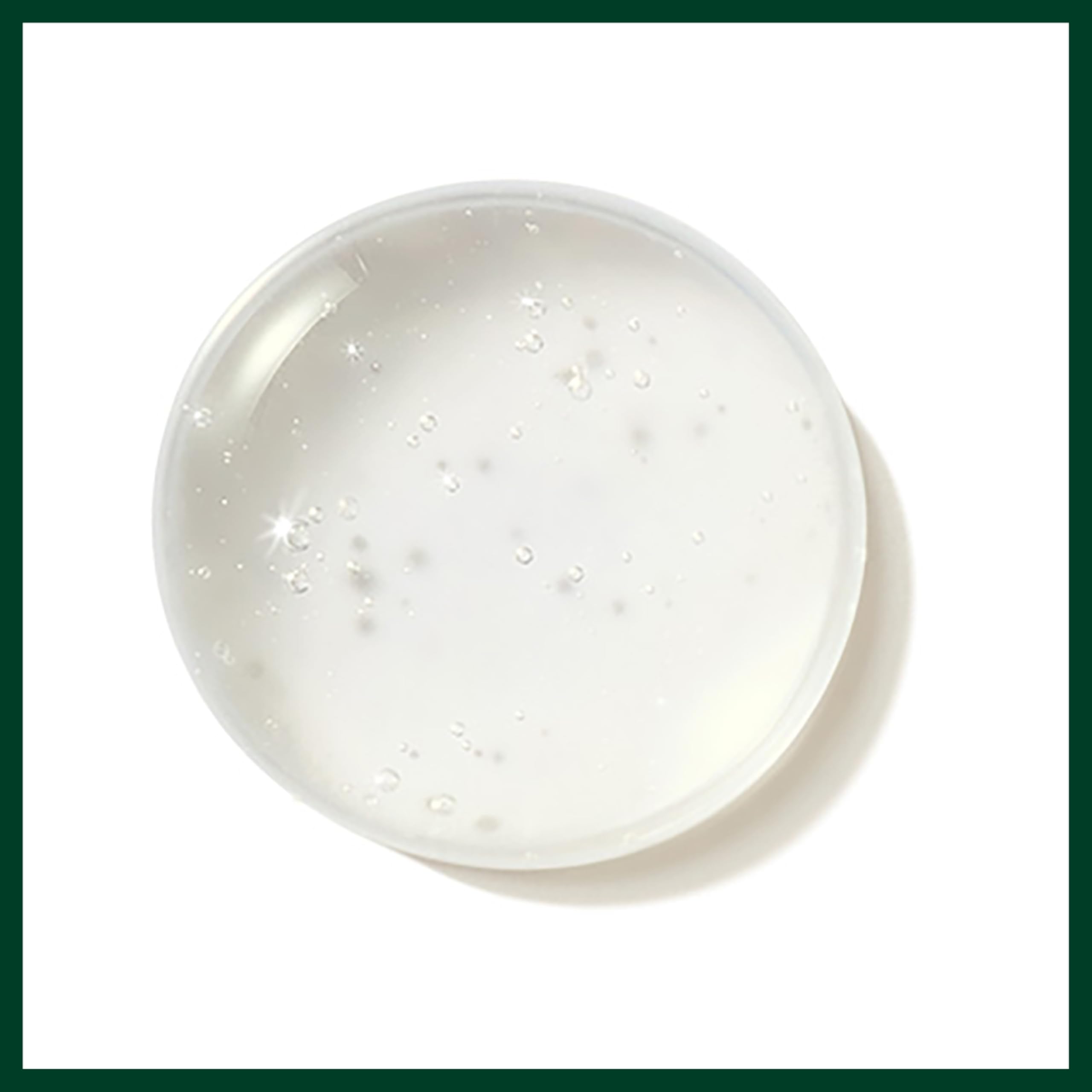 Collection of plant essences with Aveda Miraculous Oil bottle highlighting aroma benefit: calming botanical scent