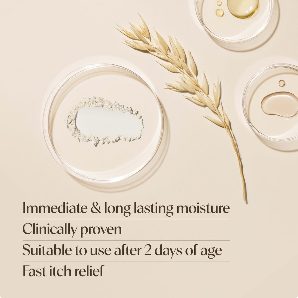 Aveeno Baby balm on towel after bath conveying quick absorption