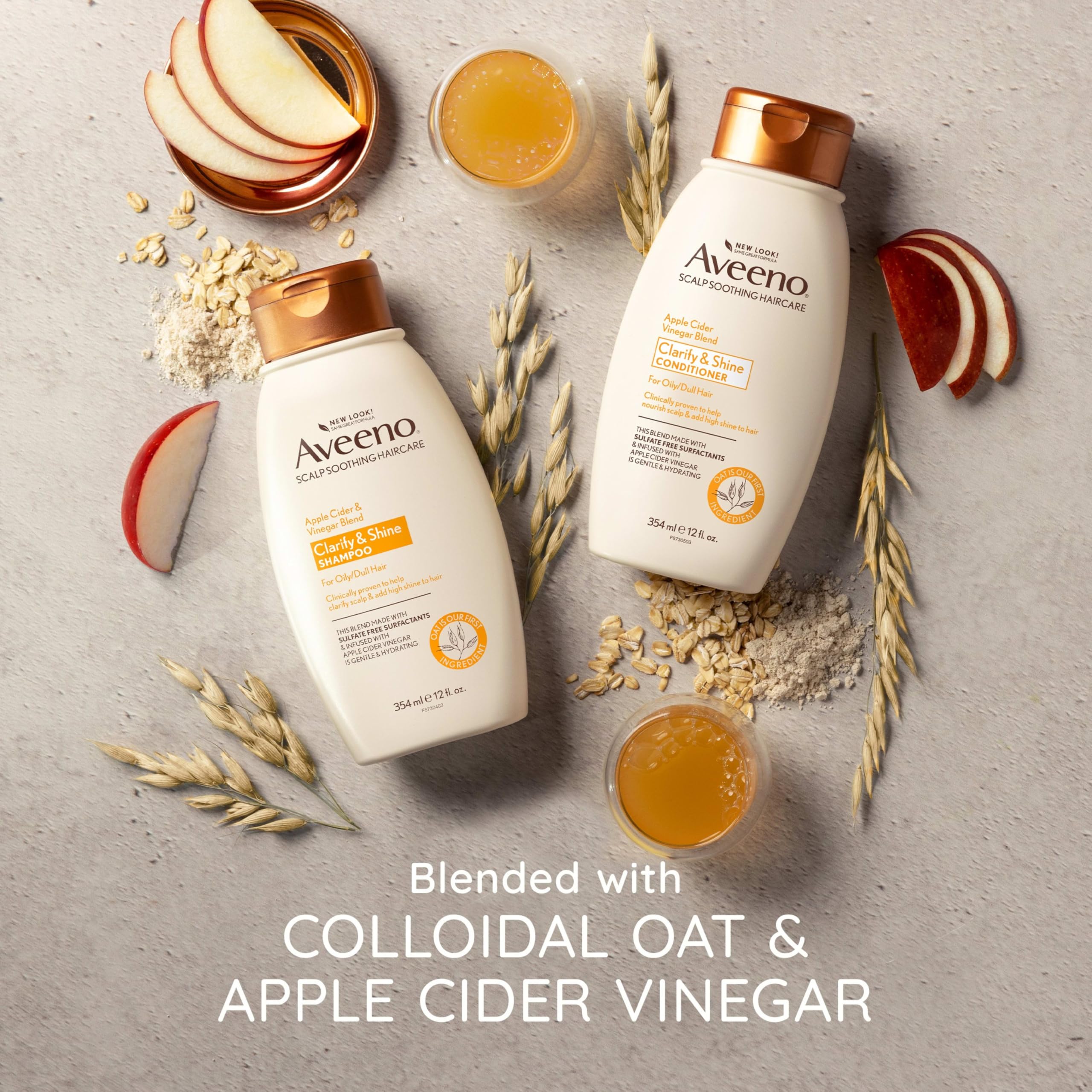 Aveeno shampoo lather in hands illustrating clarifying action that removes buildup