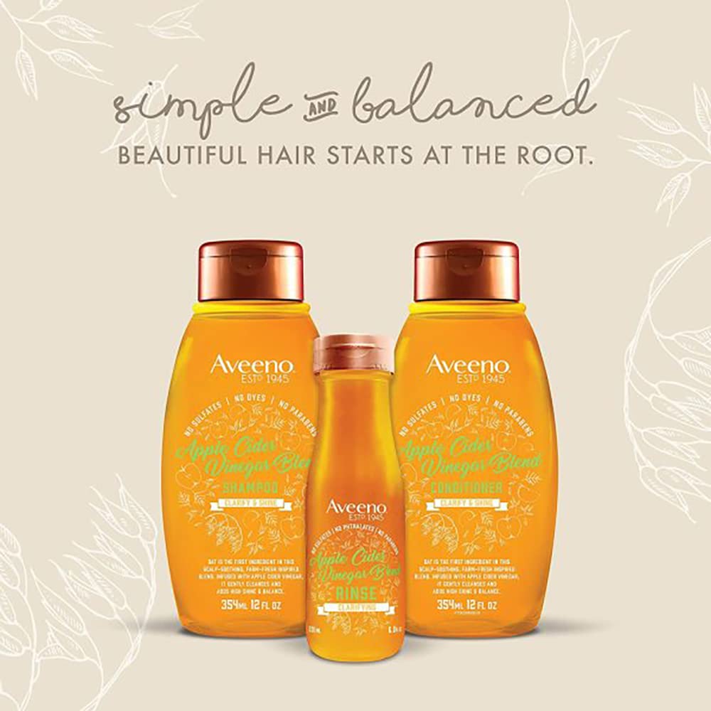 Model with shiny hair after using Aveeno set showing restored high shine and healthy look