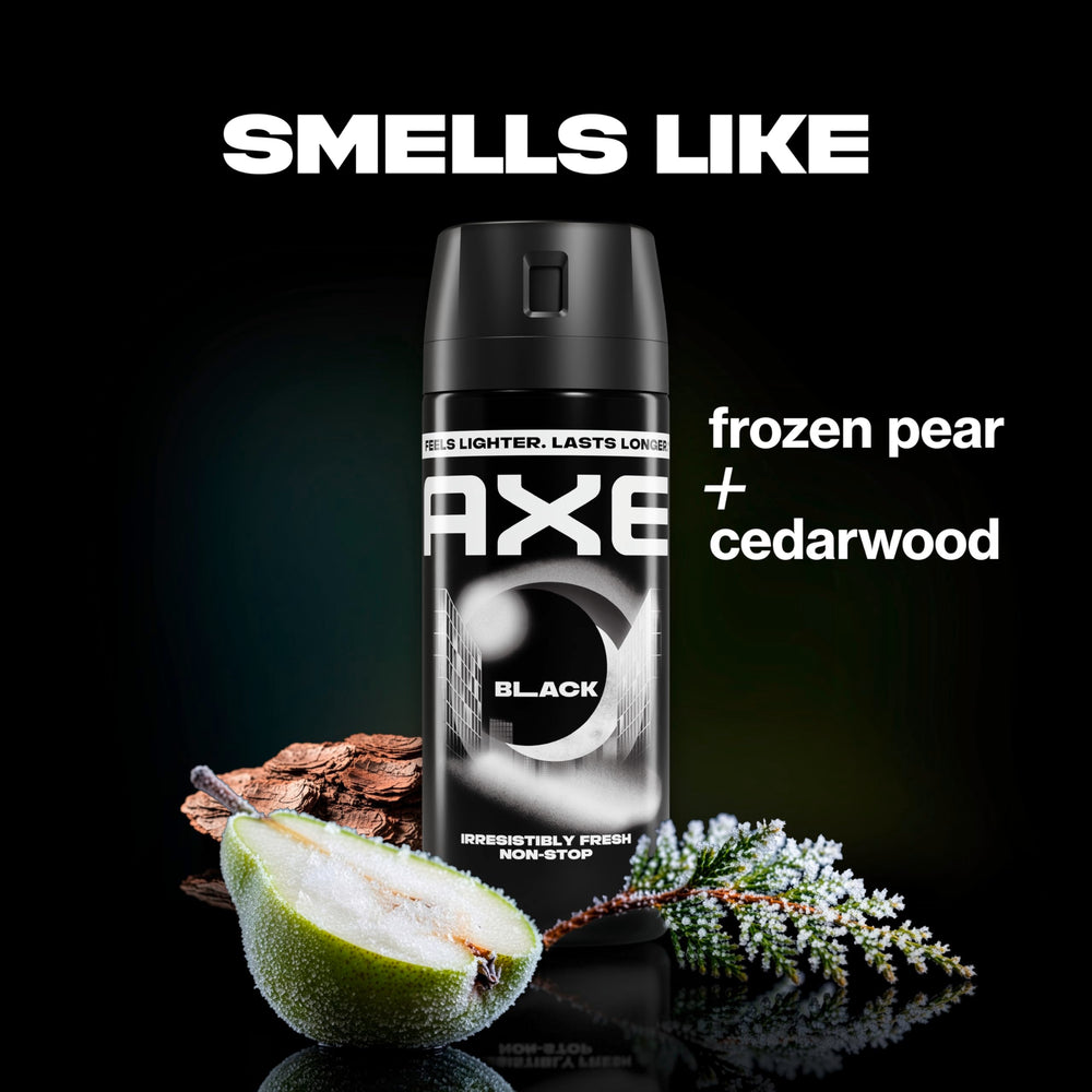 AXE Black held in hand for size comparison emphasizing portable 2.9 oz cans advantage