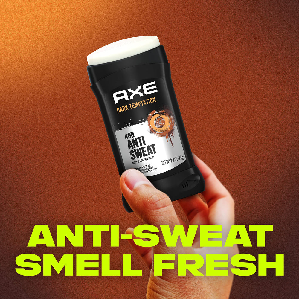 AXE Dark Temptation in use applying to underarm for dry protection