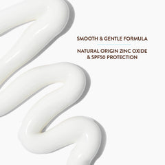Applying Babo Botanicals sunscreen on baby arm for visible coverage benefit
