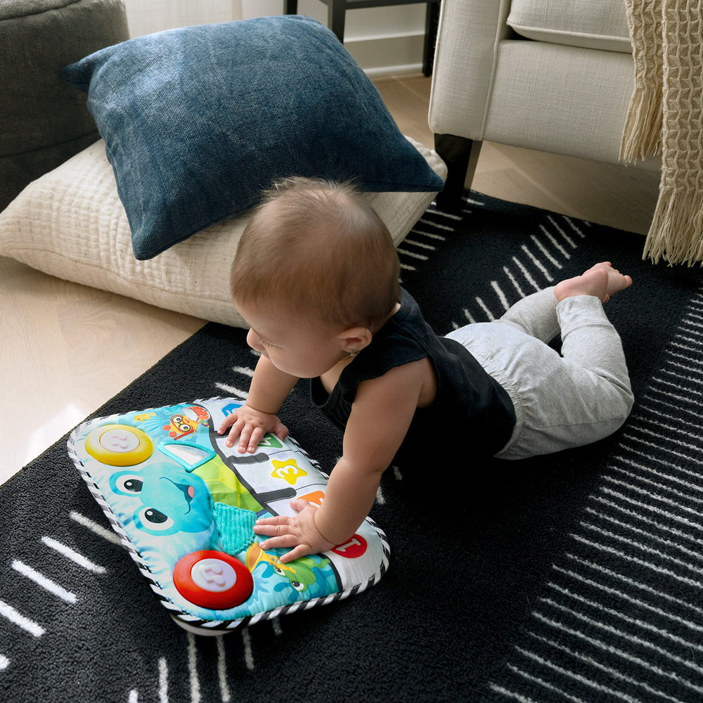 Baby Einstein control panel showing mode switches for melody, piano, and discovery