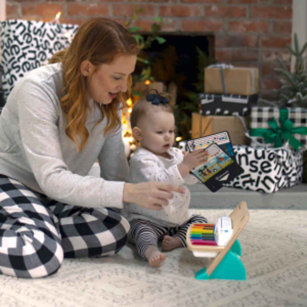 Baby Einstein battery compartment and back view showing accessible power setup and portability benefit