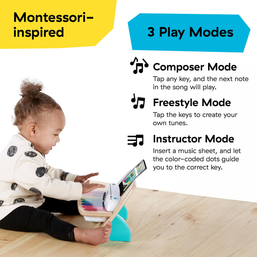 Baby Einstein toddler touching a note demonstrating Magic Touch ease and immediate sound feedback benefit