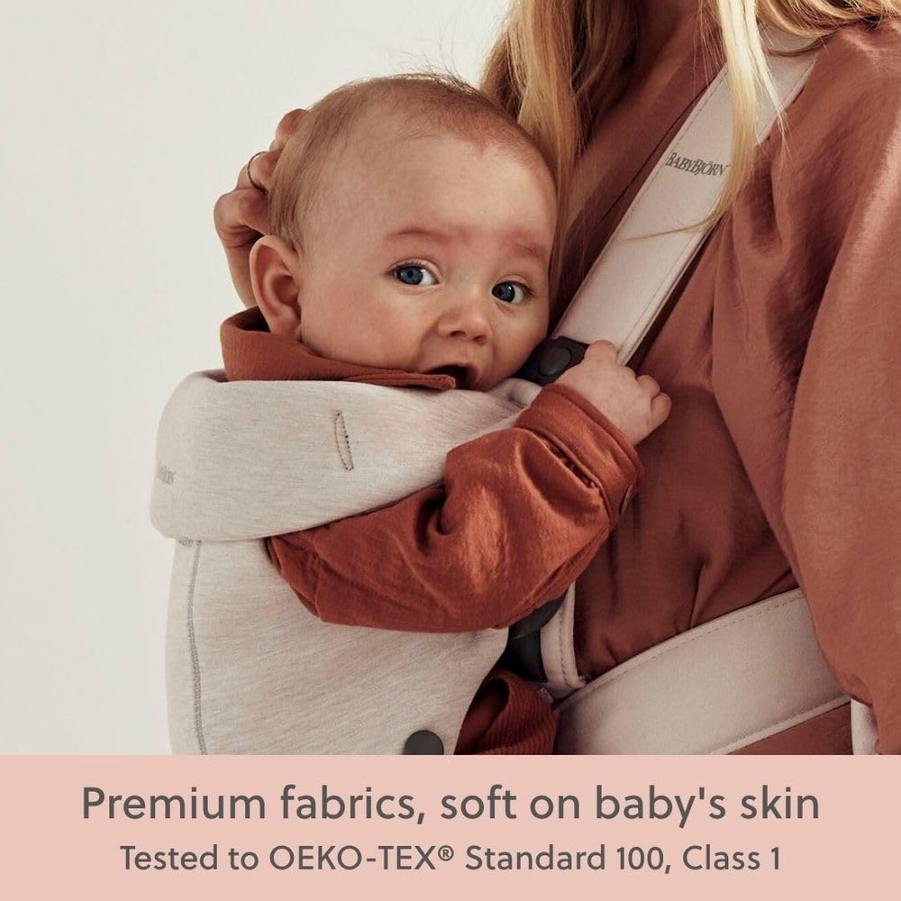 BabyBjörn carrier in use with baby facing out for brief exploration