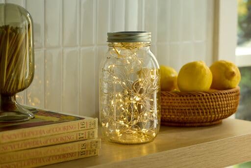 Ball jars neatly arranged in pantry demonstrating easy visual storage