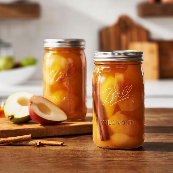 Ball three jars stacked neatly demonstrating space-saving, organized storage benefit