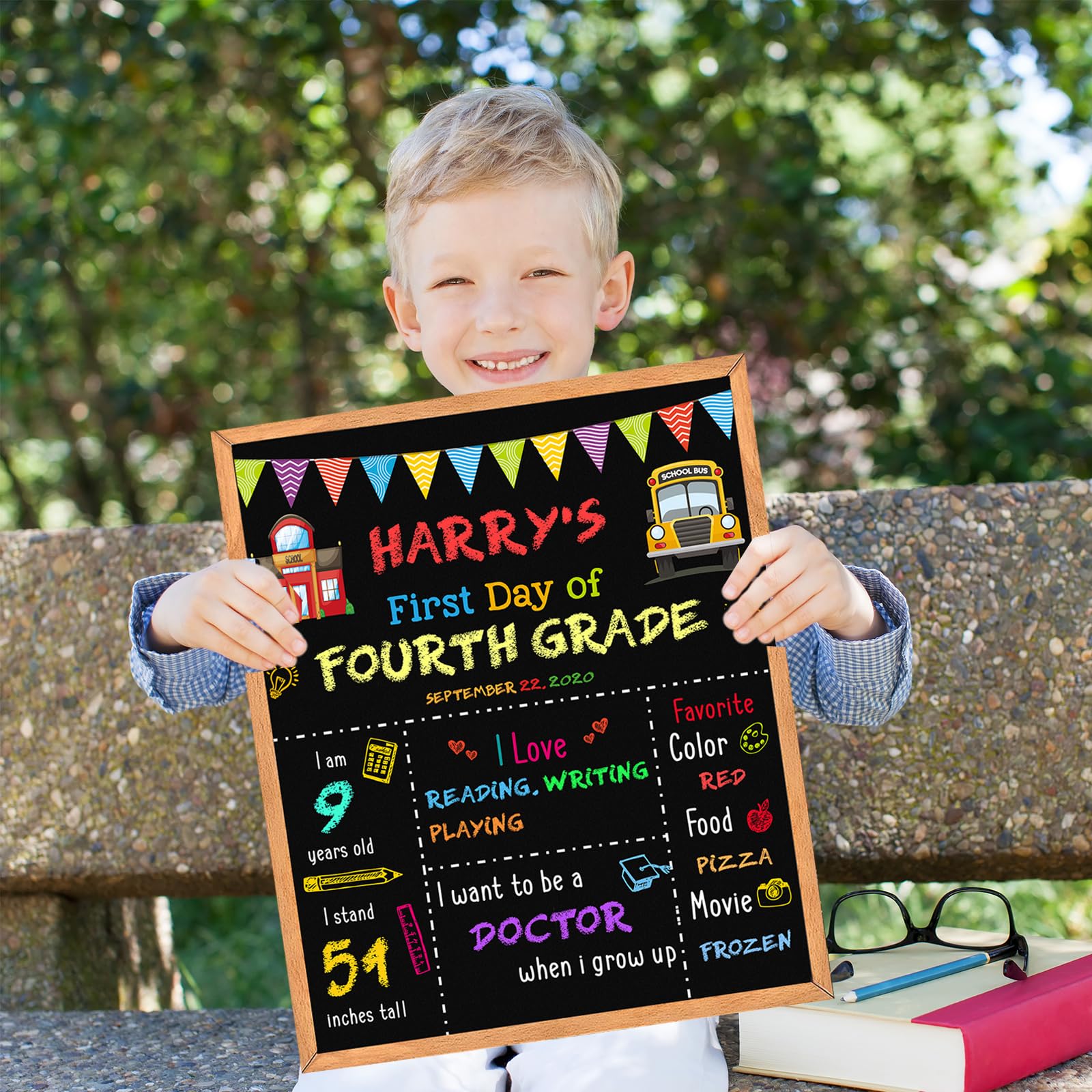 BAODLON child holding sign as photo prop showing happy memory capture