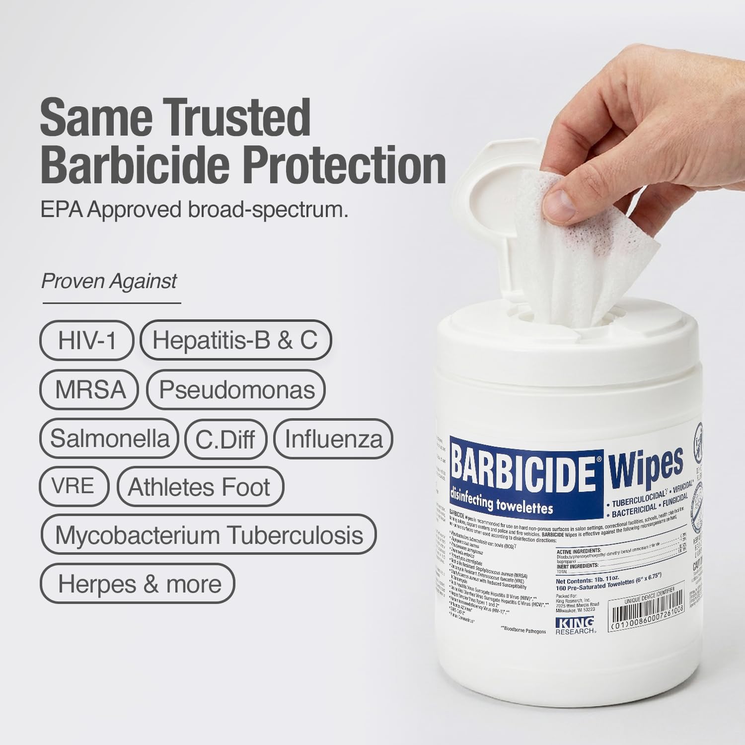 BARBICIDE wipe being used on a salon chair arm demonstrating quick disinfection