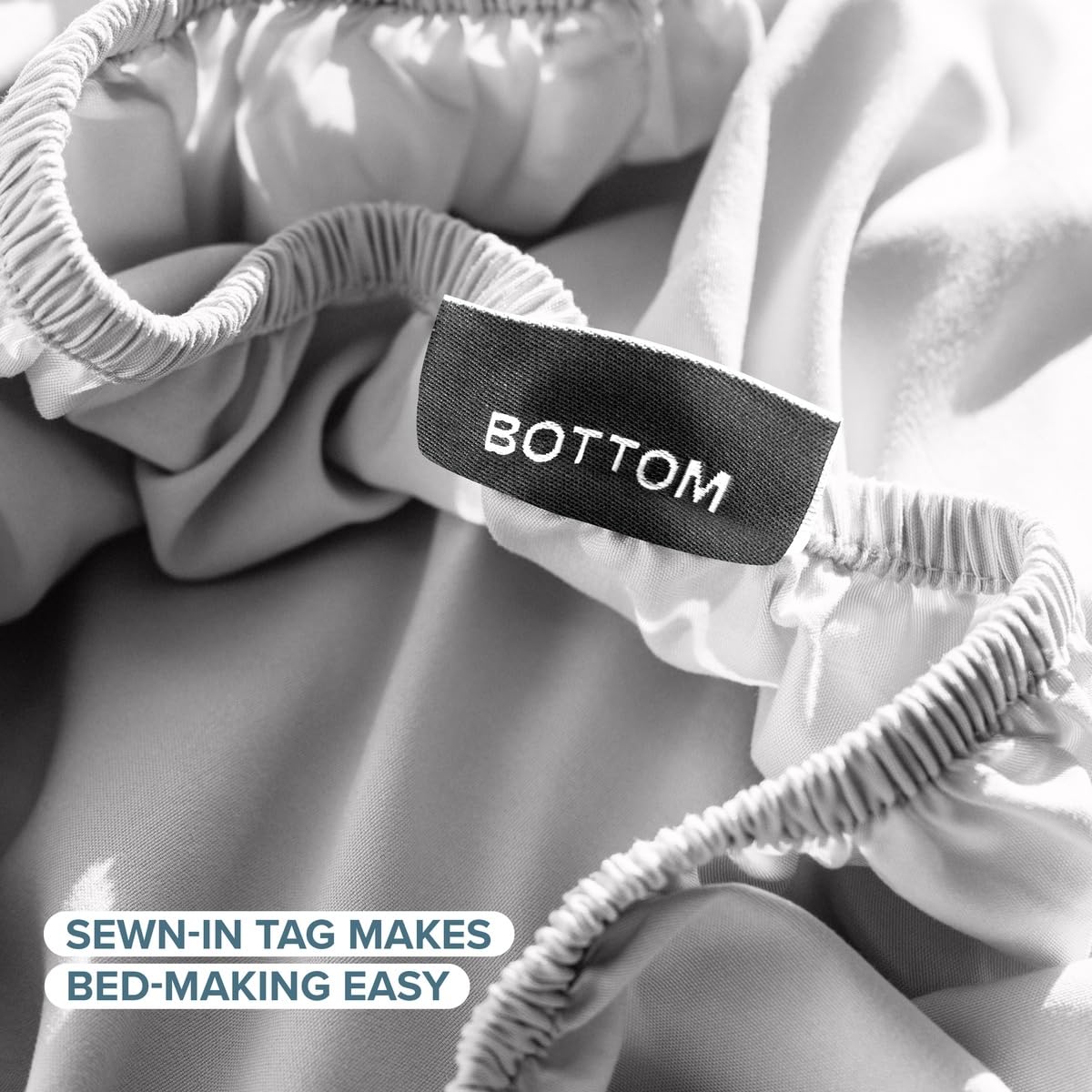 Bare Home flat sheet fully spread across Twin XL bed showing smooth drape and tidy finish