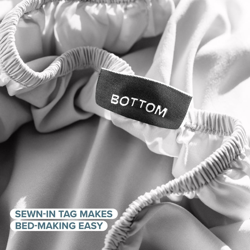 Bare Home flat sheet fully spread across Twin XL bed showing smooth drape and tidy finish