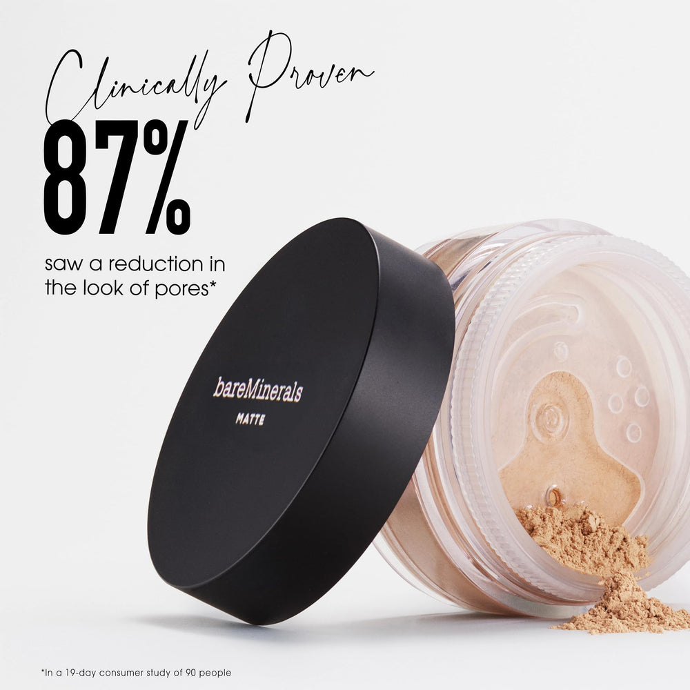 bareMinerals applying powder with brush for mattifying effect