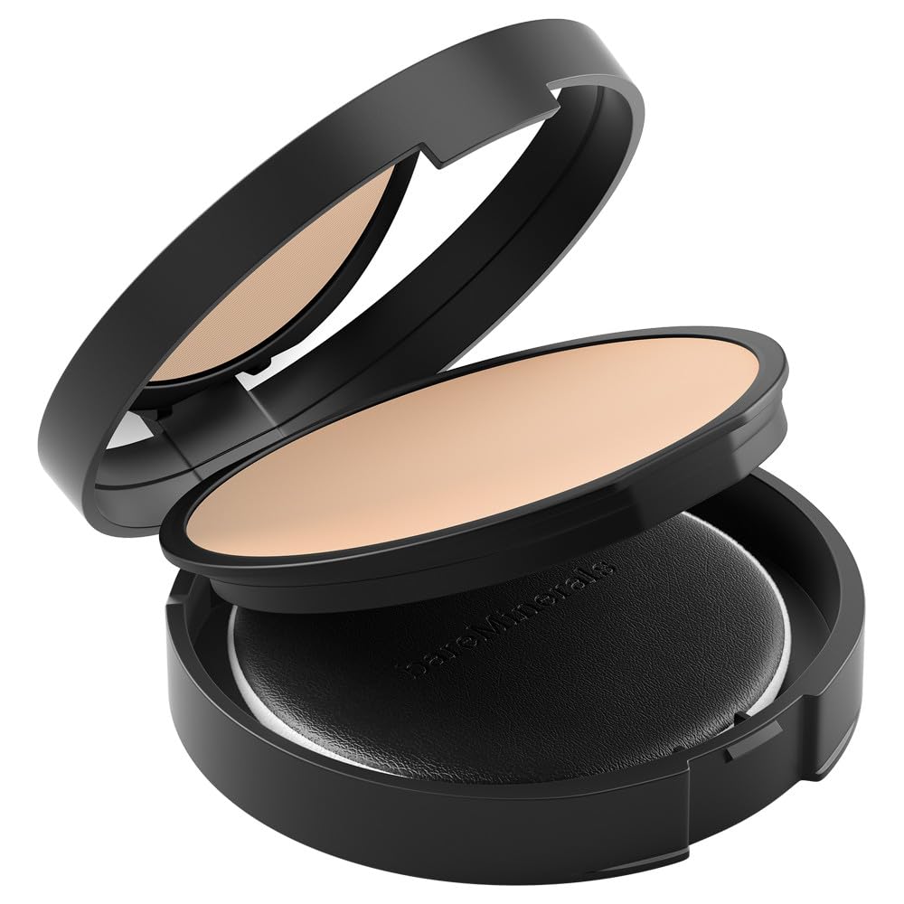 bareMinerals compact in hand showing size and convenient portability