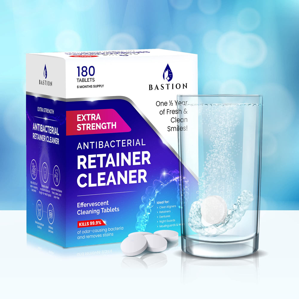 Bastion tablet dissolving in glass demonstrating fast effervescent cleaning