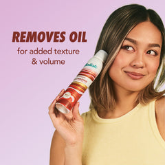 Batiste spray texture landing on hair roots for instant oil absorption benefit