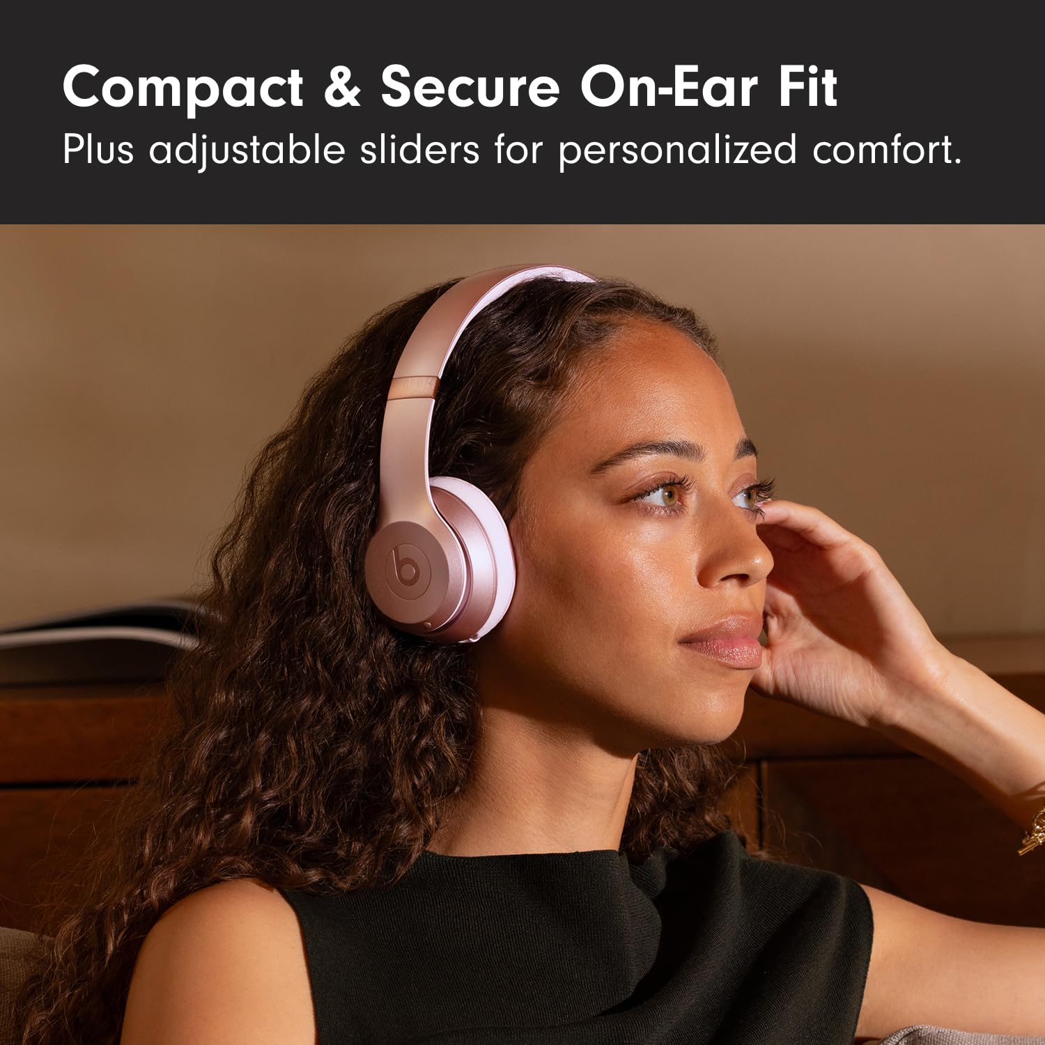 Beats Solo 4 next to USB‑C and 3.5mm cables showing lossless wired playback option