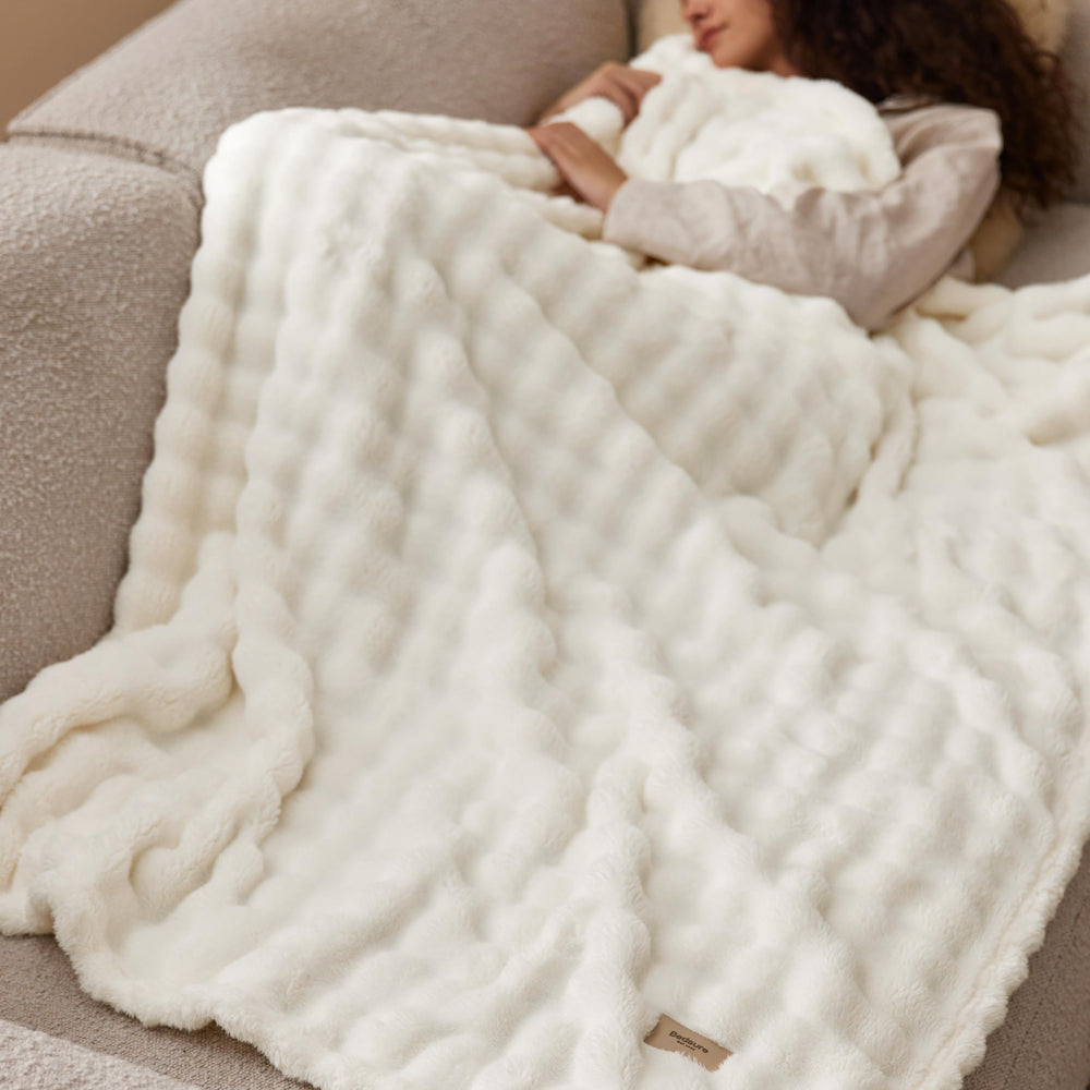 Bedsure blanket neatly stored in basket showing tidy storage and accessibility